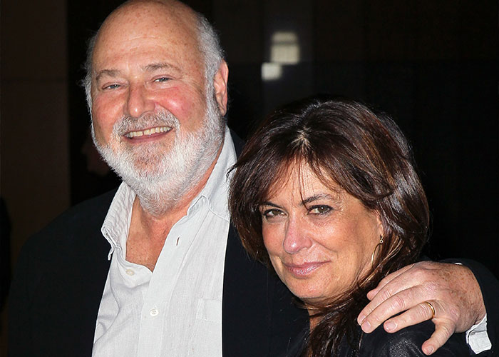 Rob Reiner smiling and posing with a woman, related to news about his son arrested for allegedly slaying parents. Rob Reiner smiling and posing with a woman, related to news about his son arrested for allegedly slaying parents.
