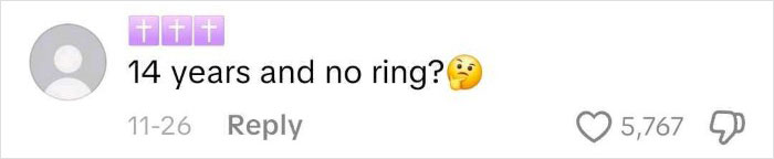 Screenshot of a social media comment questioning a 14-year relationship with no ring, sparking proposal discussion. Screenshot of a social media comment questioning a 14-year relationship with no ring, sparking proposal discussion.
