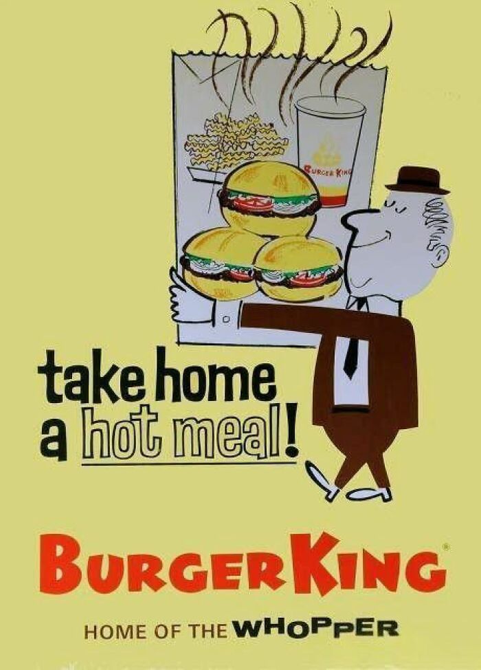 Vintage Burger King ad showing a man carrying a hot meal with burgers, fries, and a drink illustrating past marketing.