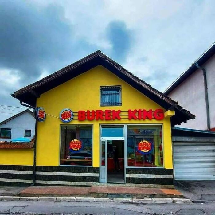 Small yellow building with Burek King signage, a humorous fast food reference popular in Eastern Europe culture.