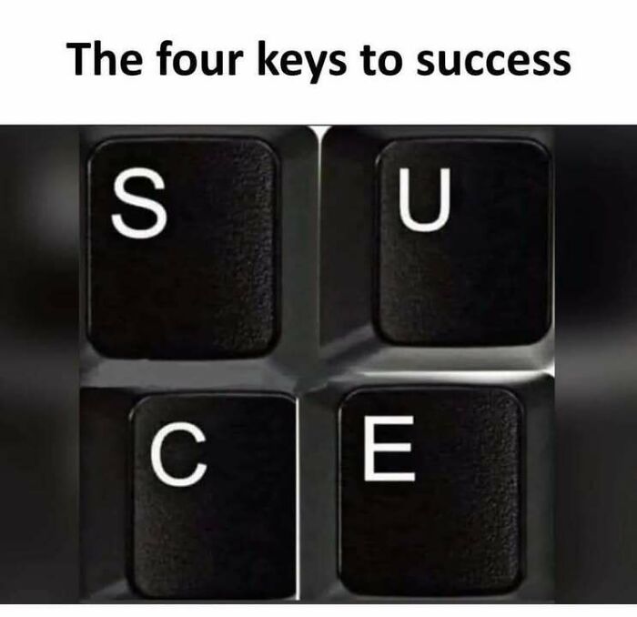 Close-up of four keyboard keys spelling success, a funny meme highlighting the four keys to success and humor in memes.