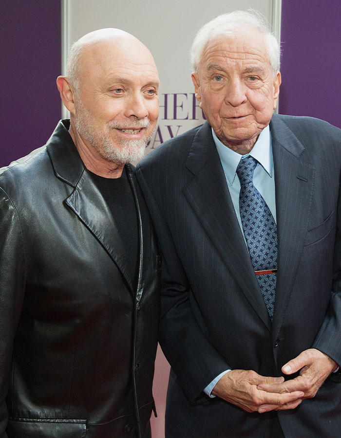 Two actors posing together at an event, illustrating outrageous demands actors have made in contracts.