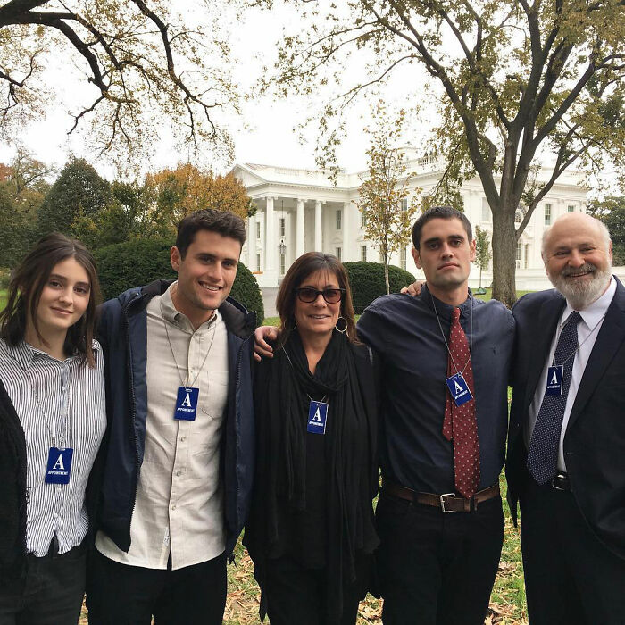 Rob Reiner&rsquo;s family posing outdoors near the White House, highlighting daughter Romy and brother Nick relationship details.
