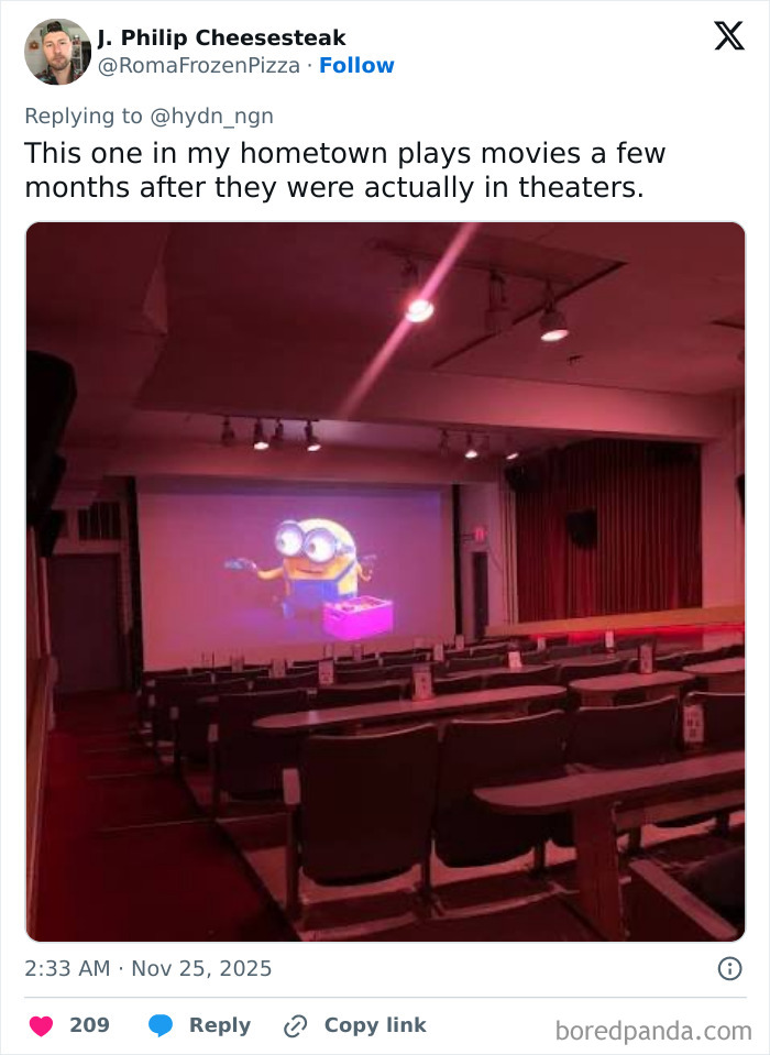 Small, outdated movie theater with rows of seats and a projected animated film, illustrating worst movie theaters experience.