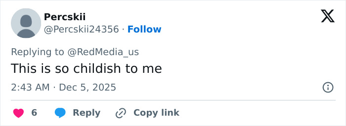 Screenshot of a social media reply criticizing Cardi B after getting new neck and back piercings with negative comments.