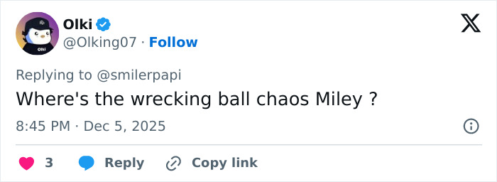 Screenshot of a social media reply commenting on Miley Cyrus’s youthful glow and viral makeover after taking veneers out.