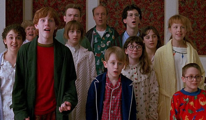 Kids in pajamas looking shocked in a scene from Home Alone as Macaulay Culkin addresses Kevin’s dad job theory. Kids in pajamas looking shocked in a scene from Home Alone as Macaulay Culkin addresses Kevin’s dad job theory.