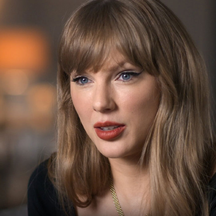 Taylor Swift close-up portrait with natural makeup, addressing false claims of coded white-nationalist messages. Taylor Swift close-up portrait with natural makeup, addressing false claims of coded white-nationalist messages.