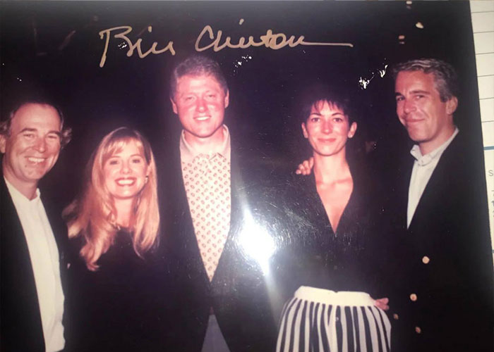 Group photo with Bill Clinton and Jeffrey Epstein linked to new disturbing Epstein desk photo controversy.