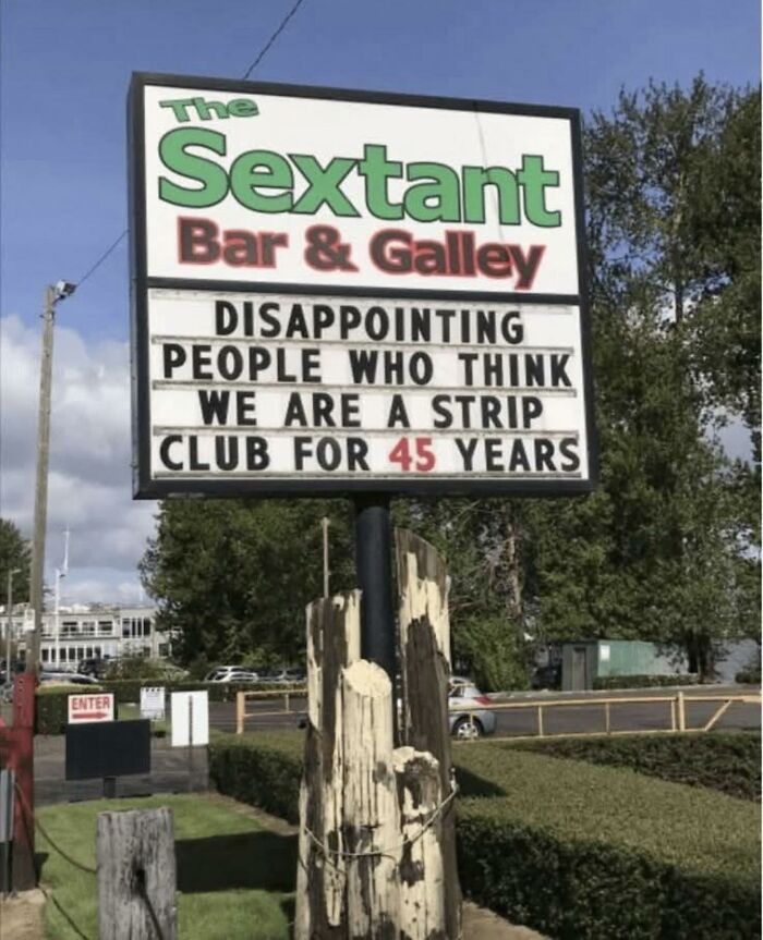 Outdoor bar sign humor at The Sextant Bar & Galley, a funny meme to brighten dark and cold winter days.