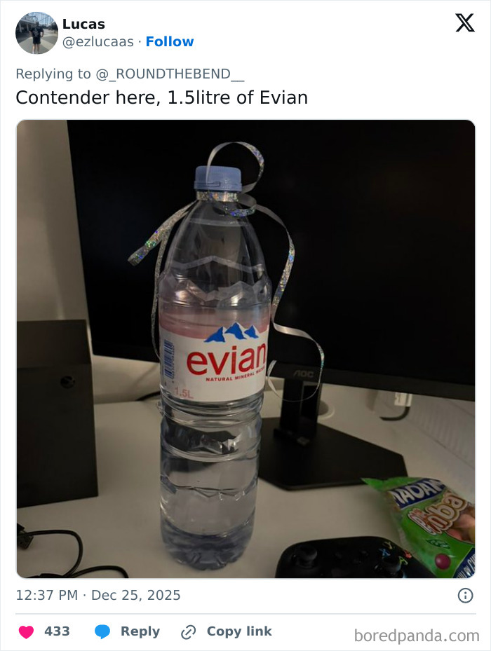 1.5-liter bottle of Evian water with ribbon, an example of some of the worst Xmas presents people received this holiday.