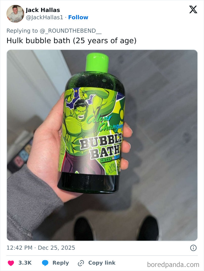 Hand holding a Hulk-themed bubble bath bottle, an example of worst Xmas presents people received this holiday.