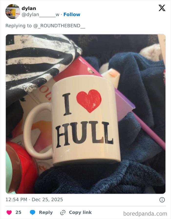 Mug with I love Hull text among random clutter, example of worst Xmas presents people received this holiday season.