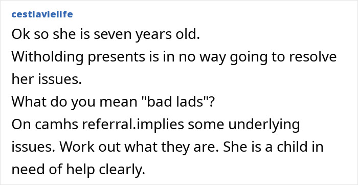 Screenshot of online comment discussing a mom withholding Christmas gifts as punishment for her 7-year-old child.
