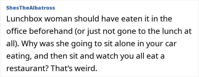 Woman standing confidently at work, ignoring social pressure from coworkers despite potential awkwardness.