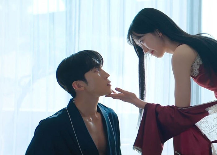 A Korean couple sharing an intimate moment in a softly lit room, evoking K-drama-style romantic encounters. A Korean couple sharing an intimate moment in a softly lit room, evoking K-drama-style romantic encounters.