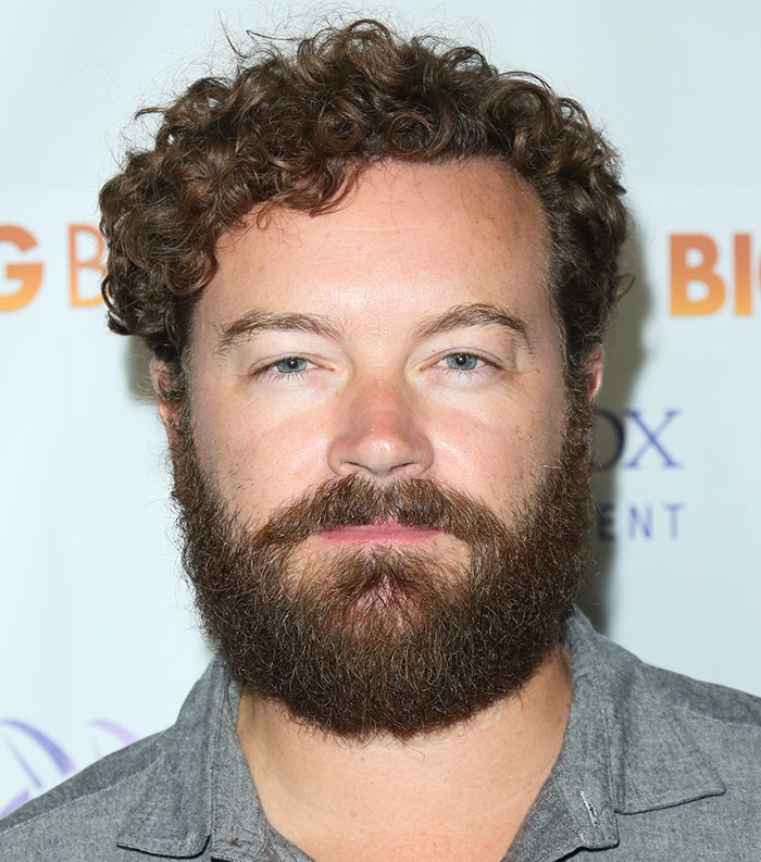 Bearded man with curly hair at a public event, representing one of the most disliked celebrities of 2025.