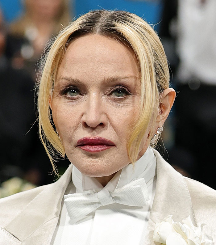 Close-up of a celebrity with blonde hair in formal attire, featured among the most disliked celebrities of 2025.