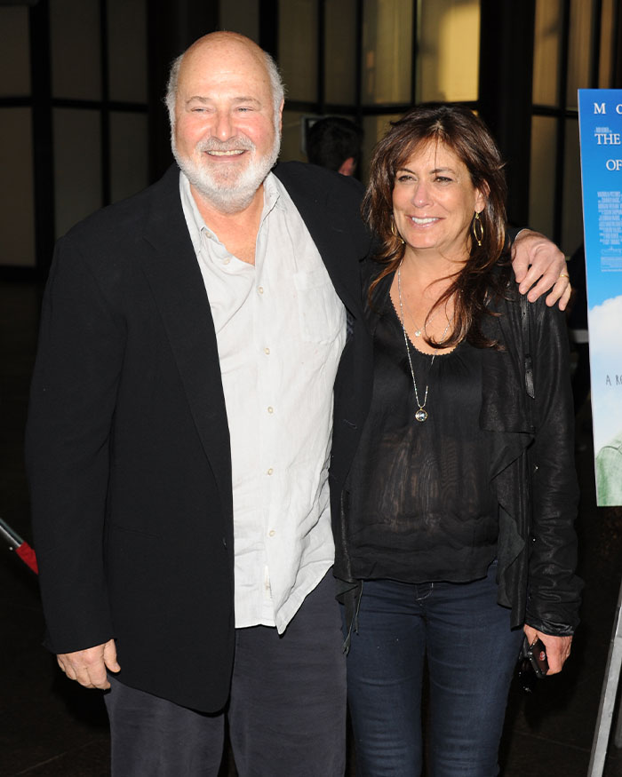 Rob Reiner and wife smiling together at an event, linked to Trump controversy over TDS claims. Rob Reiner and wife smiling together at an event, linked to Trump controversy over TDS claims.