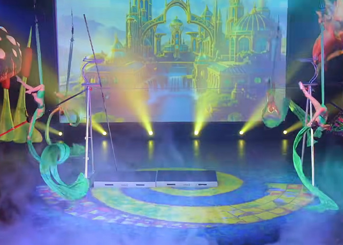 Performance from Wizard Of Oz show with acrobats and vibrant stage lights causing audience outrage and walkouts Performance from Wizard Of Oz show with acrobats and vibrant stage lights causing audience outrage and walkouts