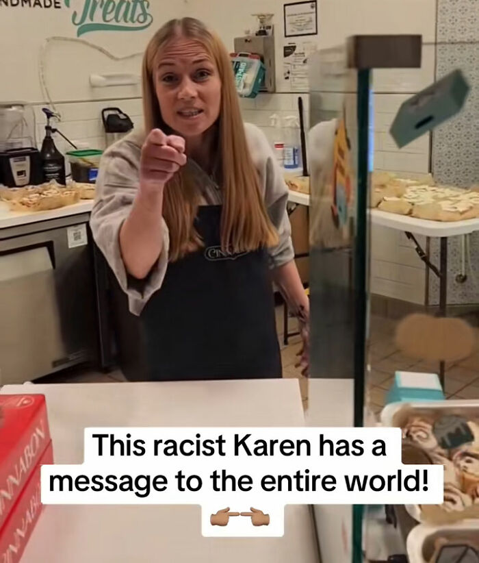 Woman in a bakery pointing aggressively, associated with racist Cinnabon employee and GoFundMe controversy. Woman in a bakery pointing aggressively, associated with racist Cinnabon employee and GoFundMe controversy.