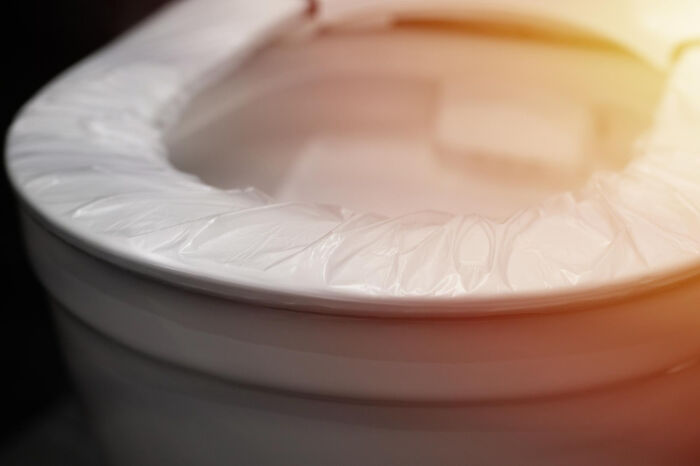 Close-up of a trash can with a plastic liner, illustrating everyday things people accidentally did wrong.