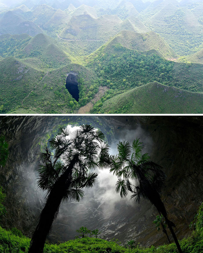 Aerial view of a heart-shaped cave surrounded by greenery, illustrating intriguing aspects of existence and reality.
