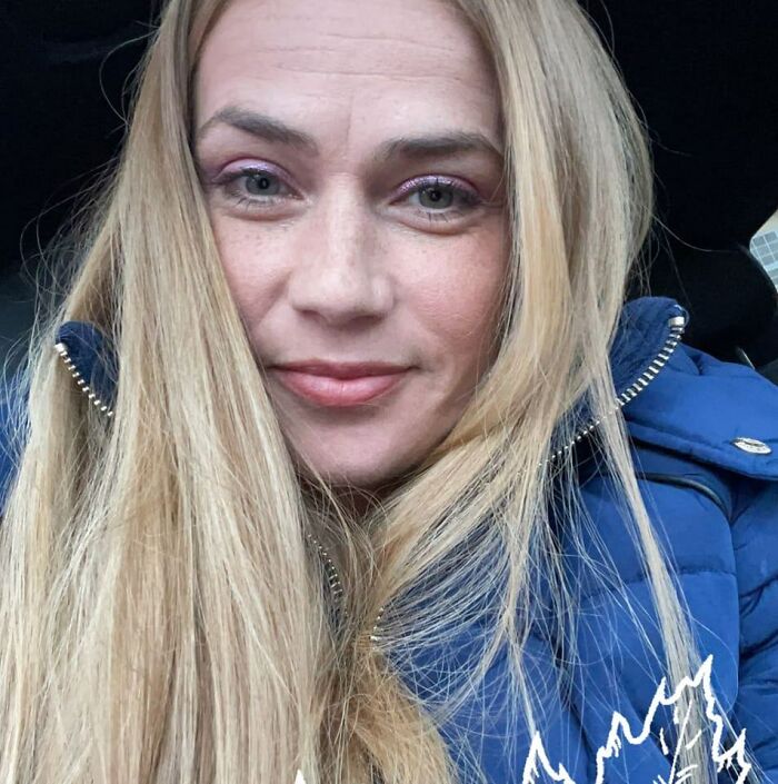Close-up of a woman with long blonde hair wearing a blue jacket, related to Cinnabon worker's racist tirade against Somali couple. Close-up of a woman with long blonde hair wearing a blue jacket, related to Cinnabon worker's racist tirade against Somali couple.