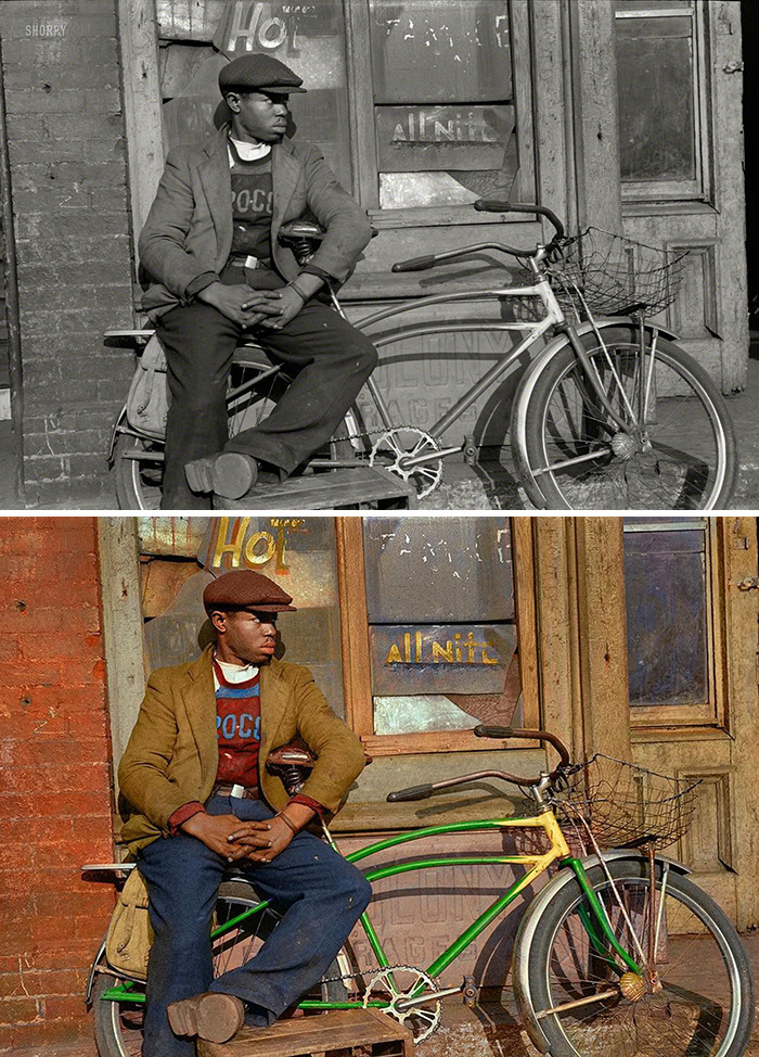 Black man sitting on a vintage bicycle outside a building, showcasing artist colorizes old photos with vivid detail.
