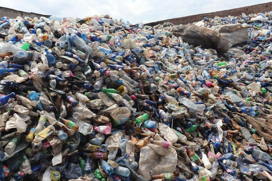 Huge landfill filled with plastic bottles and waste, illustrating pollution in some of the dirtiest countries in the world. Huge landfill filled with plastic bottles and waste, illustrating pollution in some of the dirtiest countries in the world.