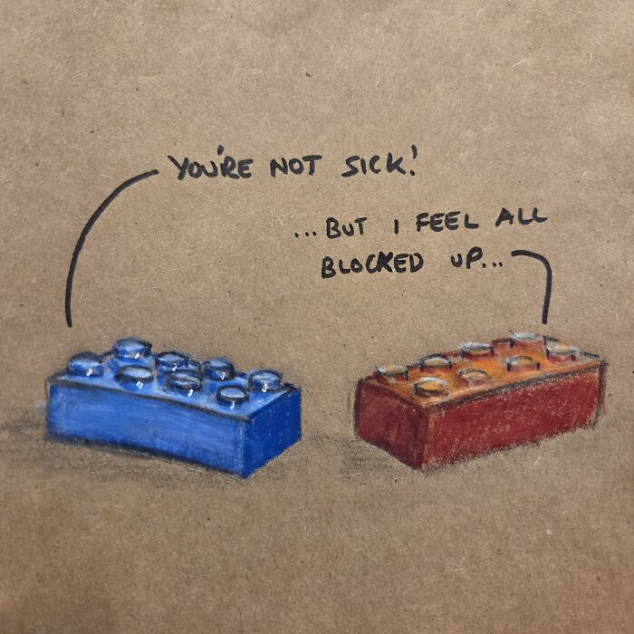 Two colorful building blocks with a dad joke drawn on a brown lunch bag, showcasing new dad jokes and puns.