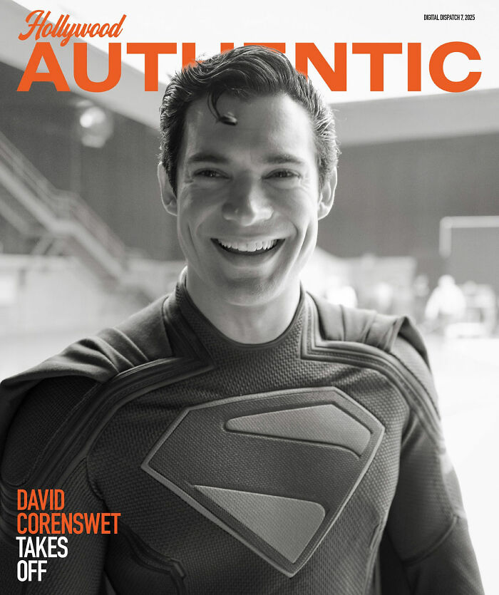 David Corenswet smiling in a Superman costume, sparking conversation about masculinity and 1950s perspectives.
