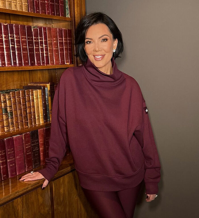 Kris Jenner poses in a burgundy outfit showing hands after viral $100k facelift and ditching gloves in public. Kris Jenner poses in a burgundy outfit showing hands after viral $100k facelift and ditching gloves in public.