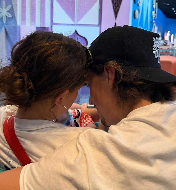 Couple closely looking at a newborn daughter, capturing a viral theory about Millie Bobby Brown's newborn daughter after new pics. Couple closely looking at a newborn daughter, capturing a viral theory about Millie Bobby Brown's newborn daughter after new pics.