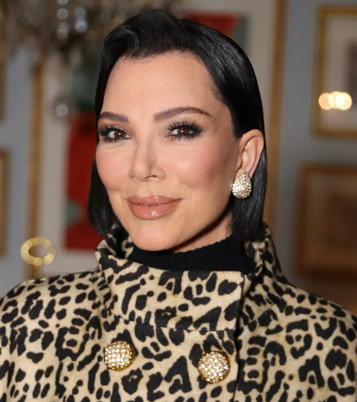 Kris Jenner without gloves in public, showcasing her hands after viral $100k facelift in a leopard print coat. Kris Jenner without gloves in public, showcasing her hands after viral $100k facelift in a leopard print coat.