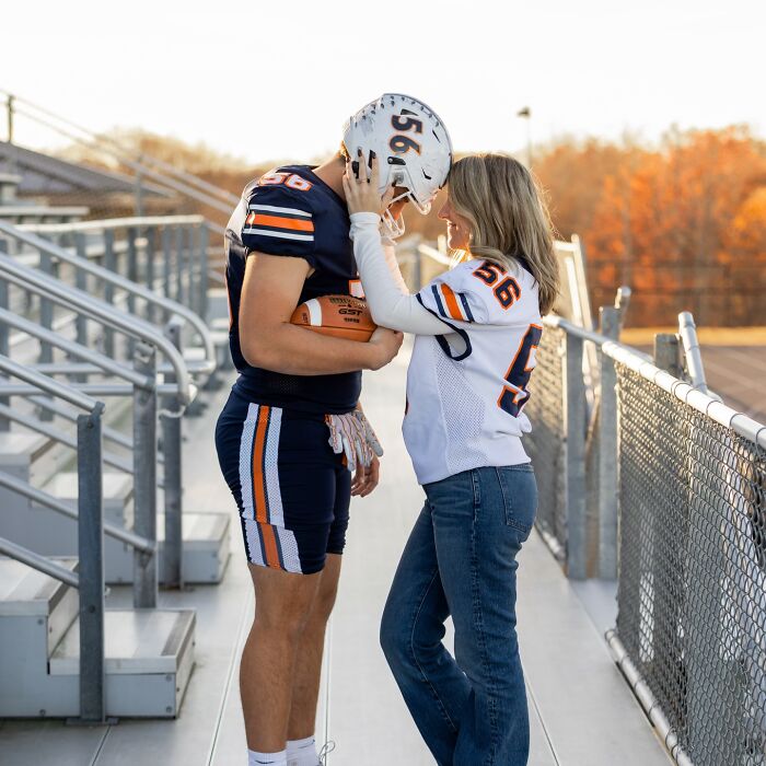 Mother and son in matching football jerseys share a tender moment in a photoshoot sparking parenting debate online. Mother and son in matching football jerseys share a tender moment in a photoshoot sparking parenting debate online.