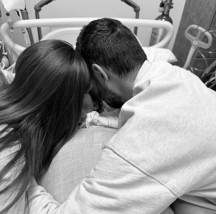 Parents grieving at hospital bedside after influencer's daughter passes away during Christmas, following loss of another daughter. Parents grieving at hospital bedside after influencer's daughter passes away during Christmas, following loss of another daughter.