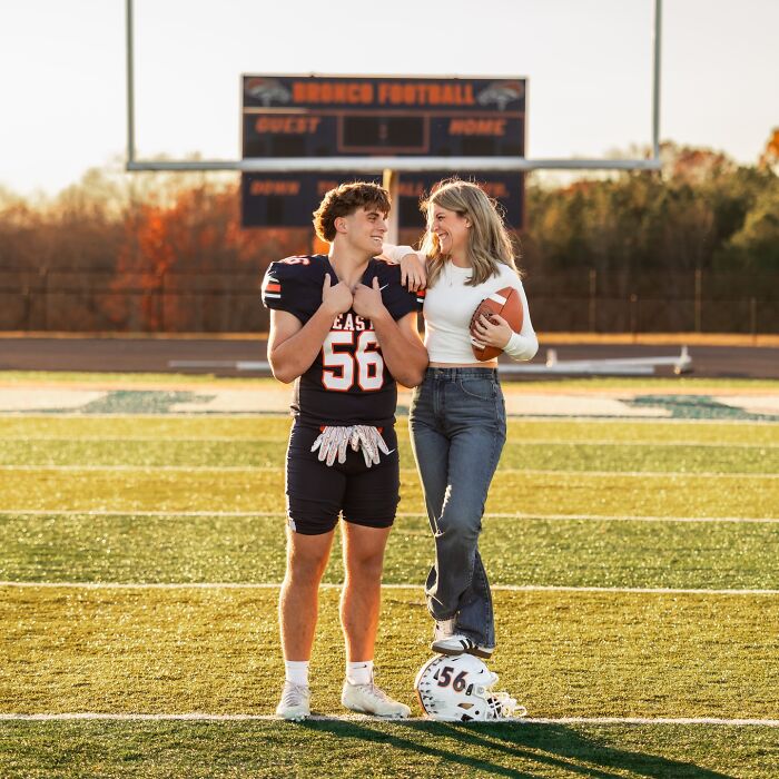 Mother and son posing on football field during photoshoot sparking viral debate about parenting and family boundaries. Mother and son posing on football field during photoshoot sparking viral debate about parenting and family boundaries.