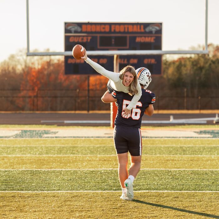 Mother and son in a playful photoshoot on football field, highlighting viral mother-son dating parenting debate. Mother and son in a playful photoshoot on football field, highlighting viral mother-son dating parenting debate.
