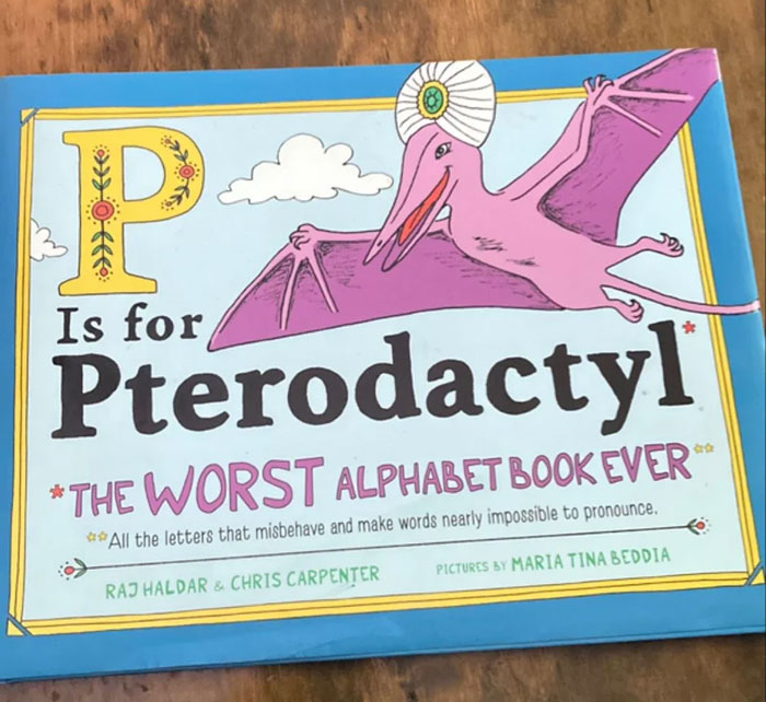 Colorful illustrated book titled P is for Pterodactyl with a pink pterodactyl, featured as a white elephant gift idea.