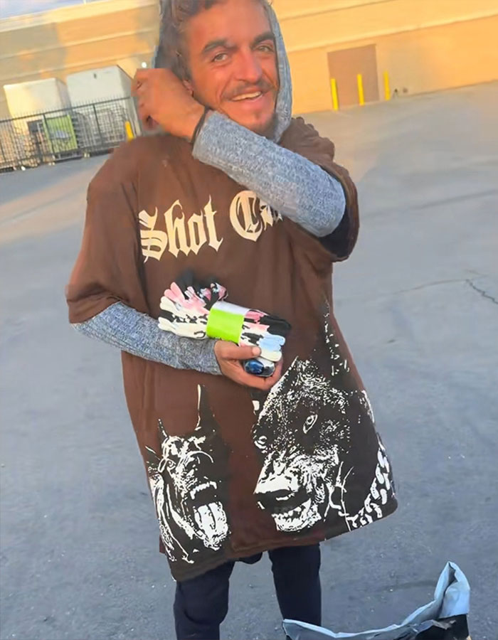 Man wearing a brown graphic shirt standing outdoors, highlighting dad of Nickelodeon star Tylor Chase with health update. Man wearing a brown graphic shirt standing outdoors, highlighting dad of Nickelodeon star Tylor Chase with health update.