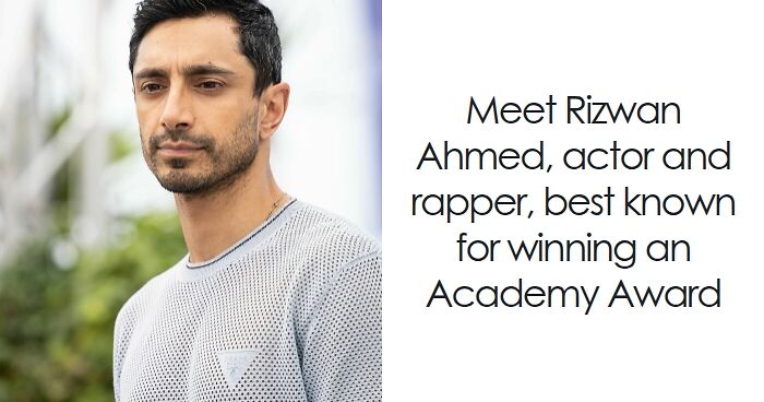 Riz Ahmed in a gray sweater outdoors, showcasing highlights from his bio and career in acting and music.