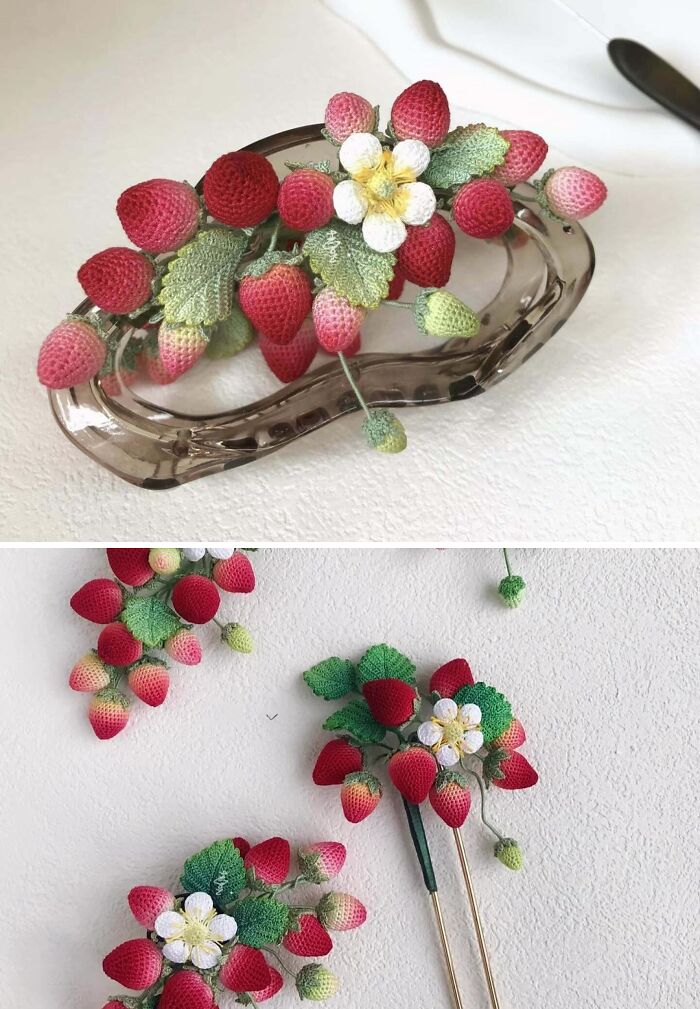Crocheted strawberries with leaves and flowers displayed creatively, showcasing cool handmade crafts to share with everyone.