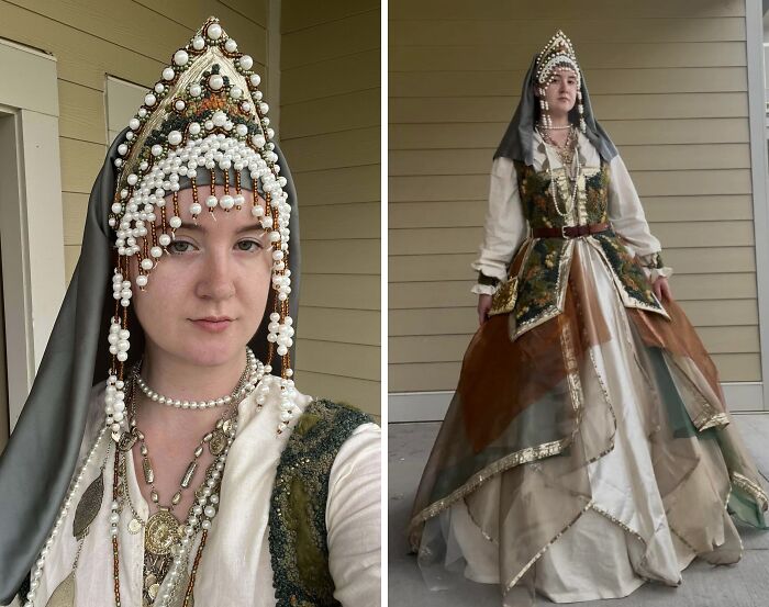 Woman in a cool handmade historical costume featuring detailed beadwork and layered fabrics, showcasing creative craftsmanship.