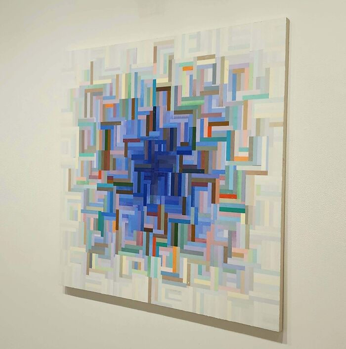 Abstract artwork made of interlocking colorful geometric shapes showcasing creativity people made to share.