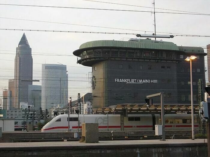 Dark, ominous building in Frankfurt with an unusual rounded top, resembling an evil building from horror movies.
