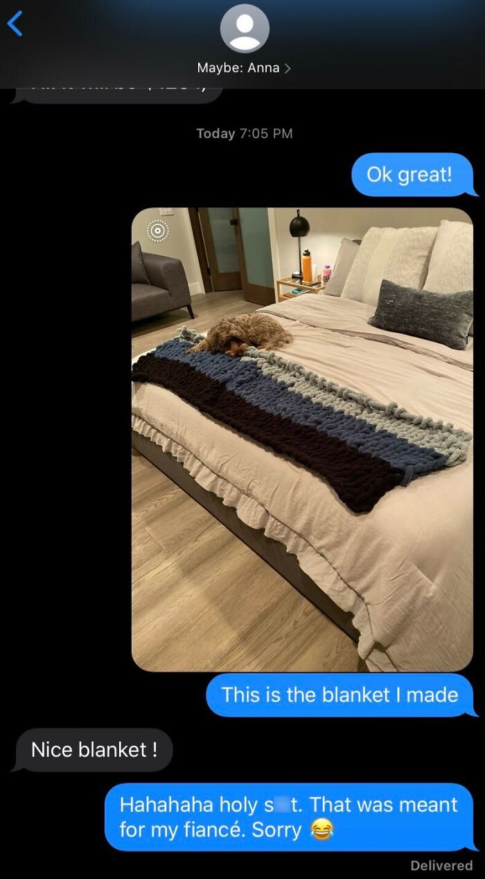 Text exchange showing funny wrong number confession about sending a blanket photo to the wrong contact by mistake.