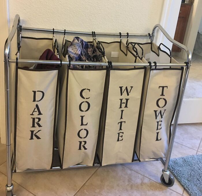 The Giant, Intimidating Pile Of Laundry You've Been Avoiding Can Now Be Divided And Conquered By The Organizational Genius Of A 4-Section Laundry Separator 