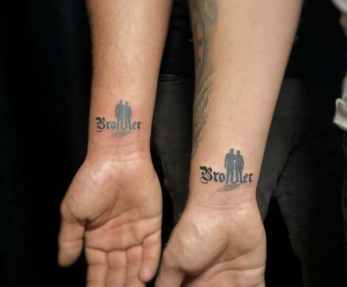 Matching brother tattoos on wrists with silhouettes, showcasing wholesome tattoos that carry a lot of meaning and family bond.