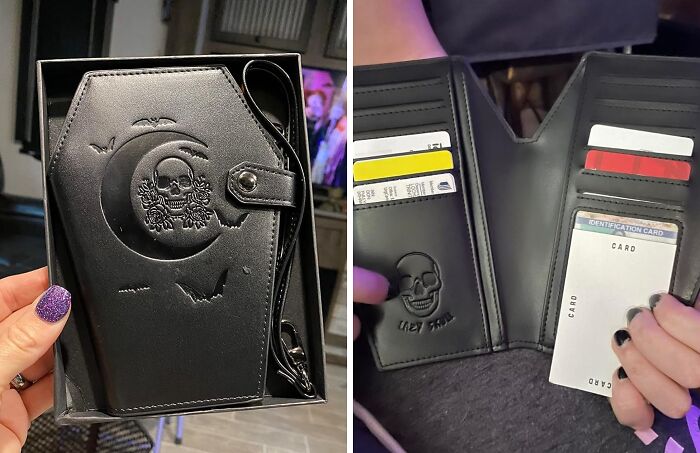 Black coffin-shaped wallet with skull design, perfect white elephant gift, featuring multiple card slots and a wrist strap.